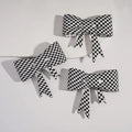 Black & White Checkered Bowknot Silicone Straw Topper